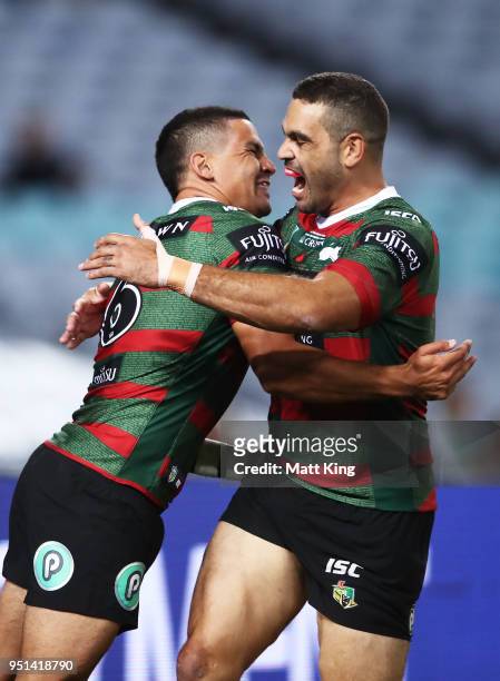 Cody Walker of the Rabbitohs celebrates with Greg Inglis after scoring the first try in the NRL round eight match between the South Sydney Rabbitohs...