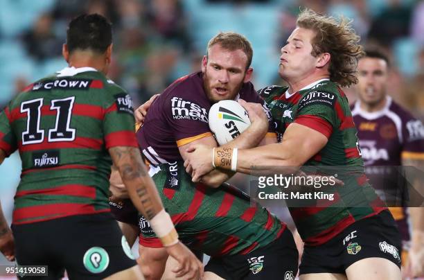 Matthew Lodge of the Broncos is tackled in the NRL round eight match between the South Sydney Rabbitohs and the Brisbane Broncos at ANZ Stadium on...