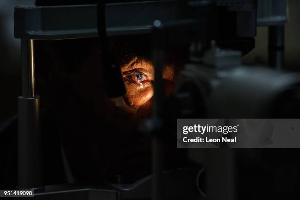 Corneal edema aphakia patient Jose, aged 87, undergoes post-operative tests after the previous days surgery at the IRO on April 19, 2018 in Trujillo,...