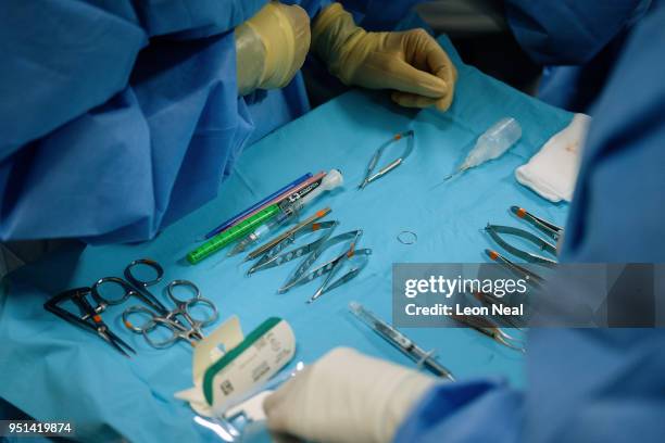 Surgical tools are seen as corneal edema aphakia patient Jose, aged 87, undergoes surgery at the IRO on April 18, 2018 in Trujillo, Peru. Following a...