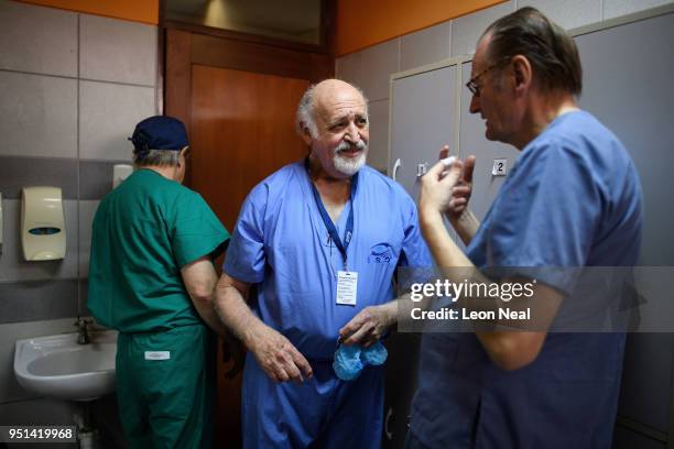 Dr Mark Mannis chats to Dr Andreas Mohr before carrying out a surgical procedure on corneal edema aphakia patient Jose, aged 87, at the IRO on April...