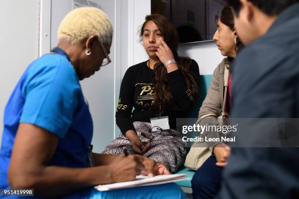 Reis-Buckler syndrome patient Diana, aged 17, gestures towards the eye which will be operated on during a pre-op interview onboard the Orbis Flying...