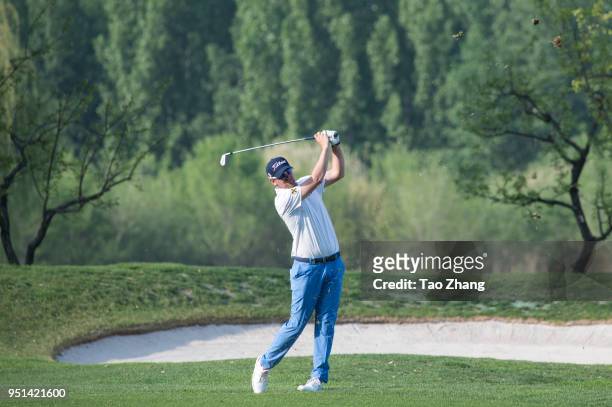 Bernd Wiesberger of Austria plays a shot during the first round of the 2018 Volvo China open at Beijing Huairou Topwin Golf and Country Club on April...