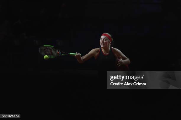 Jelena Ostapenko of Latvia plays a forehand to Zarina Diyas of Kazakhstan during day 4 of the Porsche Tennis Grand Prix at Porsche-Arena on April 26,...