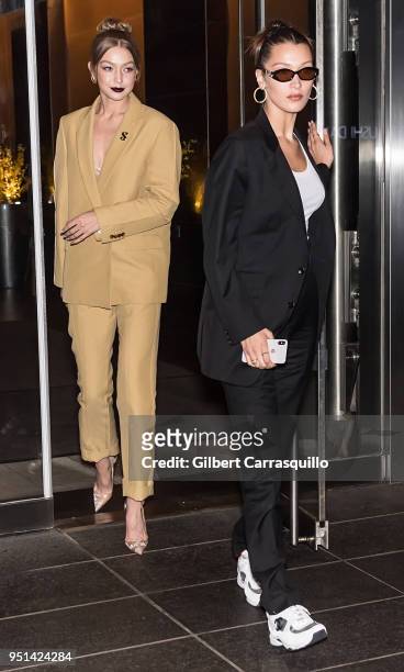 Models Gigi Hadid and Bella Hadid are seen leaving the HBO documentary series premiere of 'Being Serena' at Time Warner Center on April 25, 2018 in...