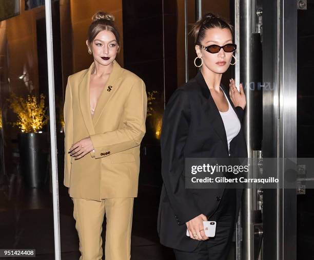 Models Gigi Hadid and Bella Hadid are seen leaving the HBO documentary series premiere of 'Being Serena' at Time Warner Center on April 25, 2018 in...