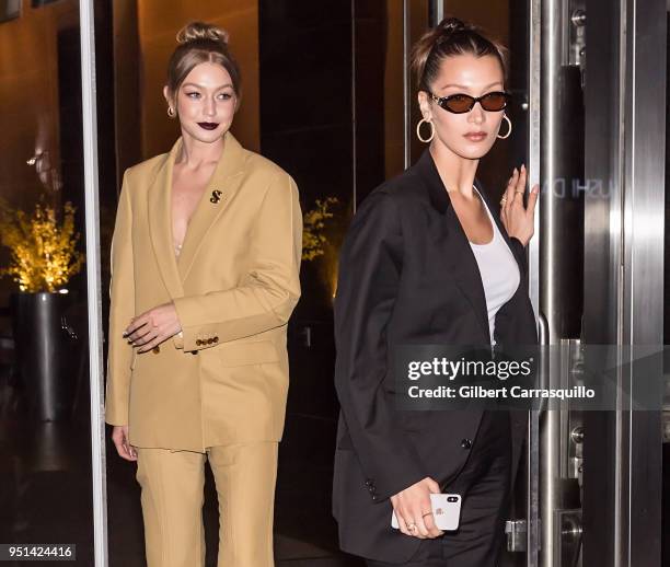 Models Gigi Hadid and Bella Hadid are seen leaving the HBO documentary series premiere of 'Being Serena' at Time Warner Center on April 25, 2018 in...