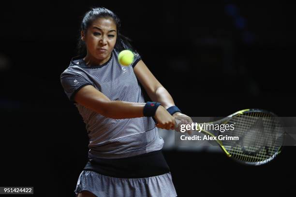 Zarina Diyas of Kazakhstan plays a backhand to Jelena Ostapenko of Latvia during day 4 of the Porsche Tennis Grand Prix at Porsche-Arena on April 26,...