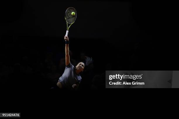 Zarina Diyas of Kazakhstan serves the ball to Jelena Ostapenko of Latvia during day 4 of the Porsche Tennis Grand Prix at Porsche-Arena on April 26,...