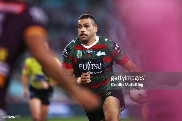 Greg Inglis of the Rabbitohs runs with the ball in the NRL round eight match between the South Sydney Rabbitohs and the Brisbane Broncos at ANZ...