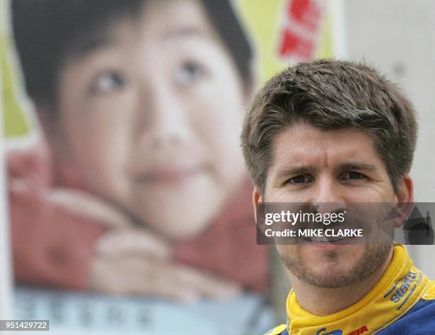 Reigning Porsche Infineon Carrera Cup Asia champion Mathew Marsh poses for a picture in the Central district of Hong Kong, 11 May 2005. Marsh is one...