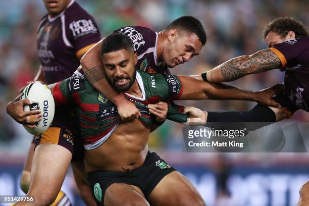 Robert Jennings of the Rabbitohs is tackled in the NRL round eight match between the South Sydney Rabbitohs and the Brisbane Broncos at ANZ Stadium...