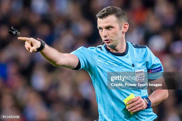 Referee Michael Oliver gestures during the UEFA Champions League 2017-18 quarter-finals match between Real Madrid and Juventus at Estadio Santiago...