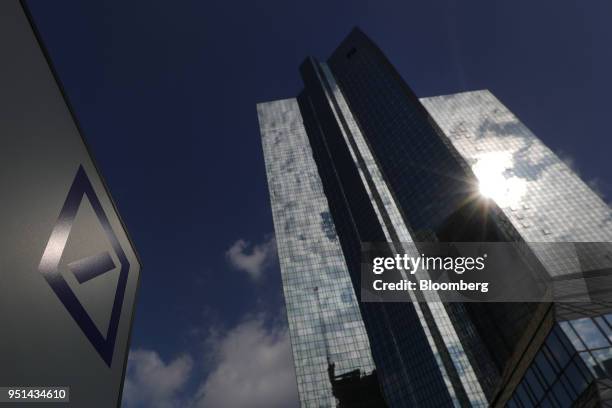 Sun reflects off the twin tower skyscraper headquarters of Deutsche Bank AG stand in Frankfurt, Germany, on Wednesday, April 25, 2018. Germanys...