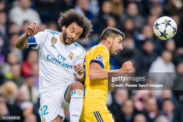 Marcelo Vieira Da Silva of Real Madrid fights for the ball with Sami Khedira of Juventus in action during the UEFA Champions League 2017-18...