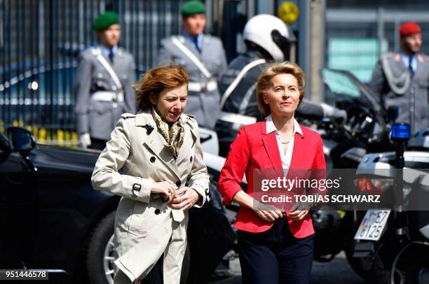 German Defence Minister Ursula von der Leyen and her French counterpart Florence Parly arrive to inspect a military honor guard at the Defence...