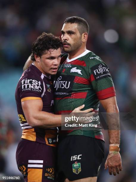 Greg Inglis of the Rabbitohs shakes hands with James Roberts of the Broncos at fulltime during the NRL round eight match between the South Sydney...