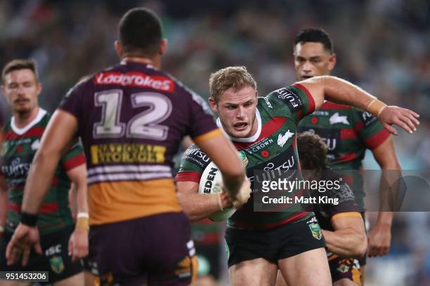 Thomas Burgess of the Rabbitohs is tackled during the NRL round eight match between the South Sydney Rabbitohs and the Brisbane Broncos at ANZ...