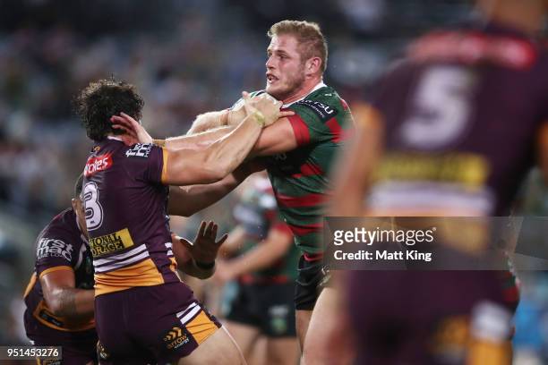 Thomas Burgess of the Rabbitohs is tackled during the NRL round eight match between the South Sydney Rabbitohs and the Brisbane Broncos at ANZ...