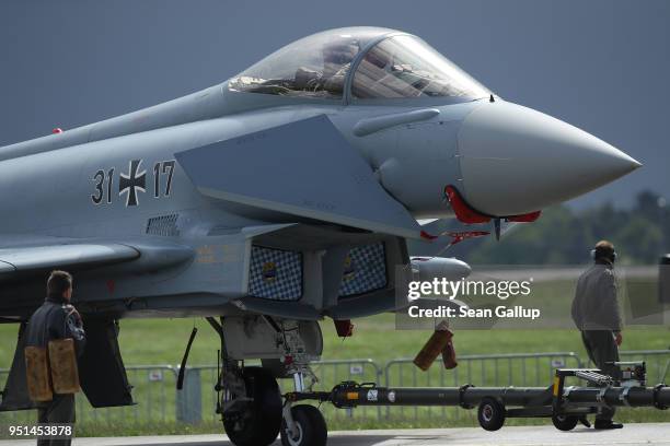 Eurofighter Typhoon jet fighter plane of the Bundeswehr, the German armed forces, stands at the ILA Berlin Air Show on April 26, 2018 in Schoenefeld,...