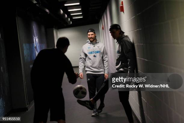 Aaron Dell of the San Jose Sharks warms up by kicking around a soccer ball prior to the game against the Anaheim Ducks in Game Four of the Western...