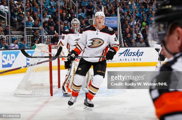 John Gibson and Josh Manson of the Anaheim Ducks defend the net against the San Jose Sharks in Game Four of the Western Conference First Round during...
