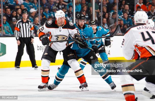 Jason Chimera of the Anaheim Ducks skates against Melker Karlsson of the San Jose Sharks in Game Four of the Western Conference First Round during...