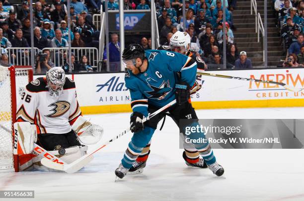 John Gibson of the Anaheim Ducks defends the net against Joe Pavelski of the San Jose Sharks in Game Four of the Western Conference First Round...