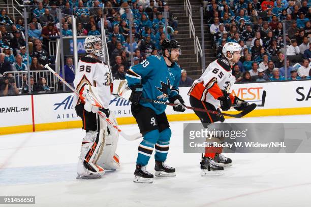 John Gibson and Marcus Pettersson of the Anaheim Ducks defend the net against Logan Couture of the San Jose Sharks in Game Four of the Western...