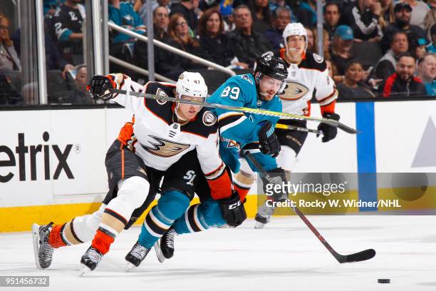 Mikkel Boedker of the San Jose Sharks skates after the puck against Hampus Lindholm of the Anaheim Ducks in Game Four of the Western Conference First...
