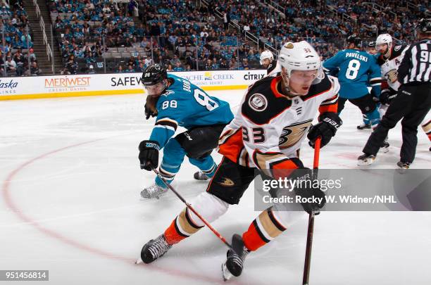 Brent Burns of the San Jose Sharks skates against Jakob Silfverberg of the Anaheim Ducks in Game Four of the Western Conference First Round during...