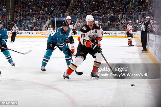 Corey Perry of the Anaheim Ducks skates against Melker Karlsson of the San Jose Sharks in Game Four of the Western Conference First Round during the...