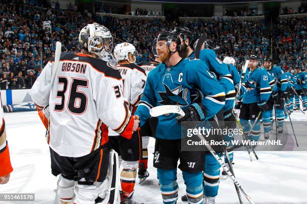 Joe Pavelski of the San Jose Sharks shakes hands with John Gibson of the Anaheim Ducks in Game Four of the Western Conference First Round during the...