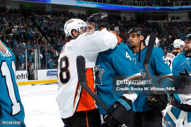 Brenden Dillon of the San Jose Sharks greets Derek Grant of the Anaheim Ducks after the game in Game Four of the Western Conference First Round...