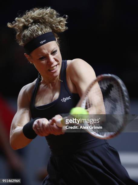 Laura Siegemund of Germany plays a backhand to CoCo Vanderweghe of the United States during day 4 of the Porsche Tennis Grand Prix at Porsche-Arena...