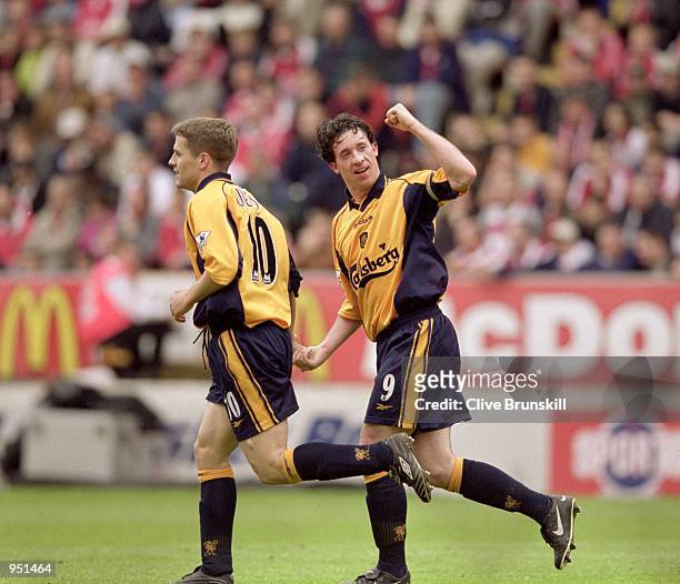 Robbie Fowler of Liverpool celebrates his goal during the FA Carling Premiership match against Charlton Athletic played at The Valley, in London....