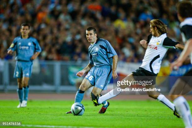 Laurent Battlles of Marseille and Angel Angulo of Valencia during the Uefa cup final match between Valencia and Marseille at Ullevi, Goteborg, Sweden...