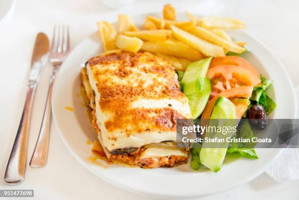 rustic greek mousaka - moussaka stockfoto's en -beelden