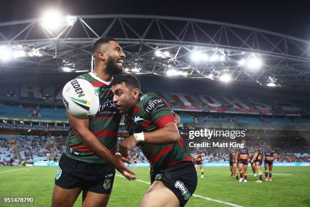 Alex Johnston of the Rabbitohs celebrates with Robert Jennings after scoring a try during the NRL round eight match between the South Sydney...