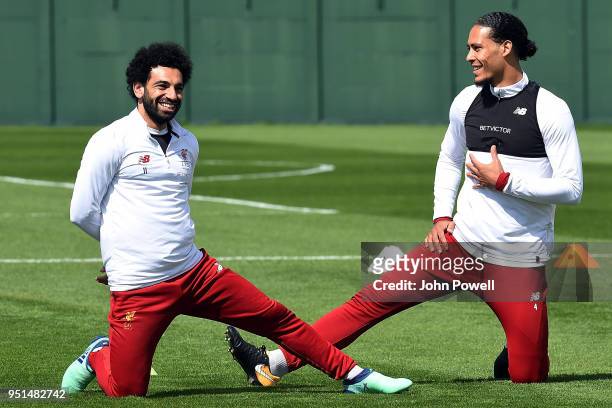 Virgil van Dijk with Mohamed Salah of Liverpool during a training session at Melwood on April 26, 2018 in Liverpool, England.