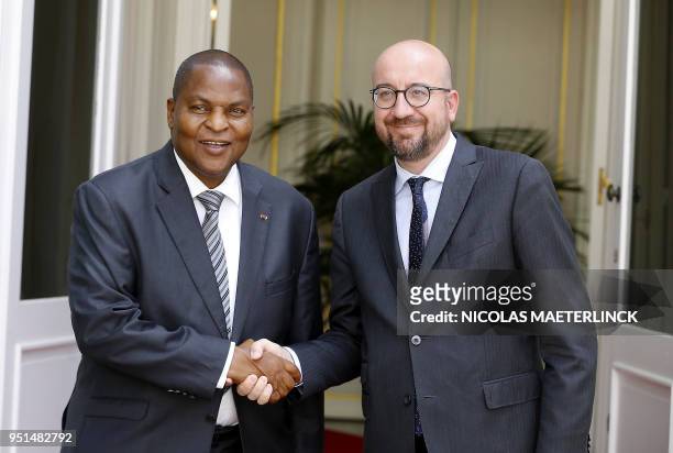 Central African Republic President Faustin-Archange Touadera and Belgian Prime Minister Charles Michel are pictured during a meeting on April 26,...