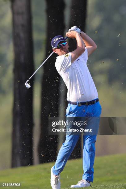 Bernd Wiesberger of Austria plays a shot during the first round of the 2018 Volvo China Open at Topwin Golf and Country Club on April 26, 2018 in...