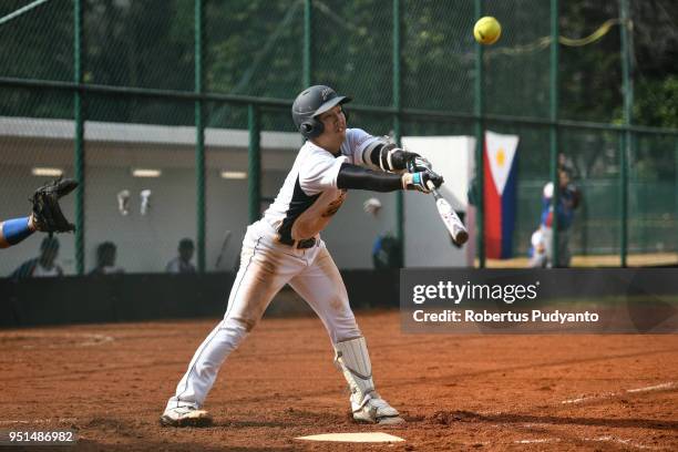 Yuto Nakajima of Japan bats during the qualification match between Japan and Philippines in the 10th Asian Men's Softball Championship on April 26,...