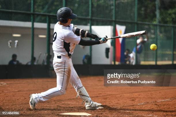Yuto Nakajima of Japan bats during the qualification match between Japan and Philippines in the 10th Asian Men's Softball Championship on April 26,...