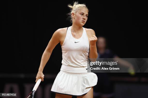 Marta Kostyuk of Ukraine celebrates during her match against Caroline Garcia of France during day 4 of the Porsche Tennis Grand Prix at Porsche-Arena...