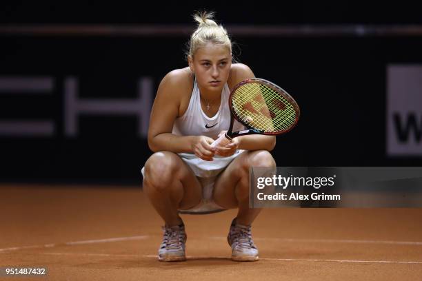 Marta Kostyuk of Ukraine reacts during her match against Caroline Garcia of France during day 4 of the Porsche Tennis Grand Prix at Porsche-Arena on...