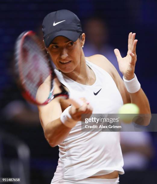 Caroline Garcia of France plays a forehand to Marta Kostyuk of Ukraine during day 4 of the Porsche Tennis Grand Prix at Porsche-Arena on April 26,...