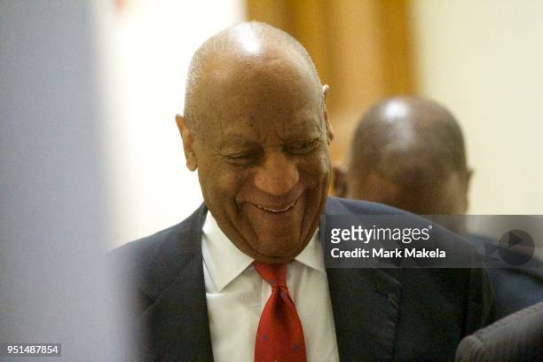 Bill Cosby walks through the Montgomery County Courthouse for day fourteen of his sexual assault retrial, as the jury deliberates for the second day,...