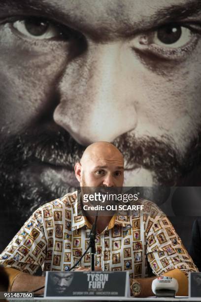 Former British heavyweight world boxing champion Tyson Fury attends a press conference to publicise his return to the ring at the Lowry Hotel in...