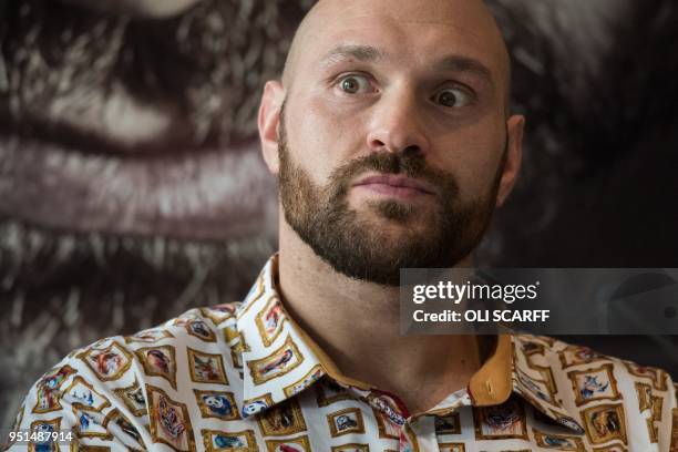 Former British heavyweight world boxing champion Tyson Fury attends a press conference to publicise his return to the ring at the Lowry Hotel in...